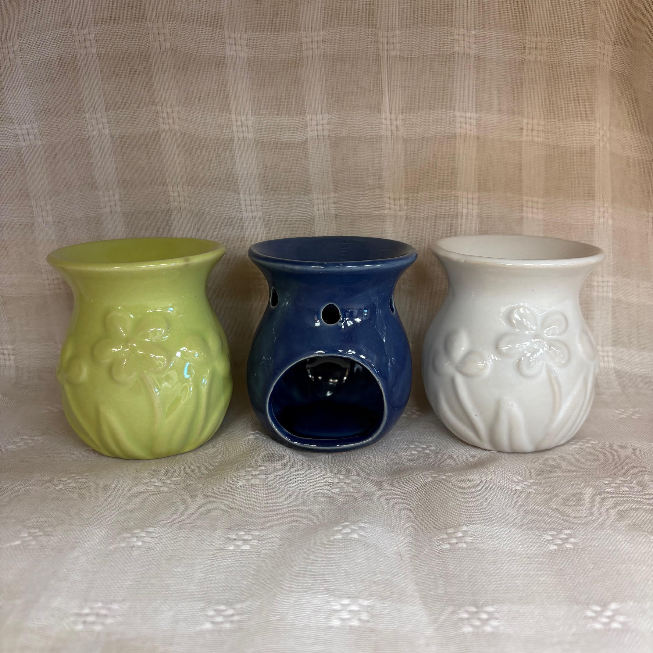 מבערי פרחים קטנים בכמה צבעים מבערי פרחים קטנים בכמה צבעים